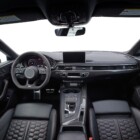 Inside moden car background, luxury car interior elements wallpaper. Empty car with transparent outside background, png illustration. Black leather car interior