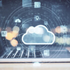 Laptop with cloud computing diagram. Cloud computing and communication concept.