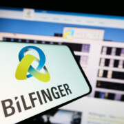 Stuttgart, Germany - 09-14-2023: Mobile phone with logo of German construction company Bilfinger SE on screen in front of website. Focus on center-right of phone display.