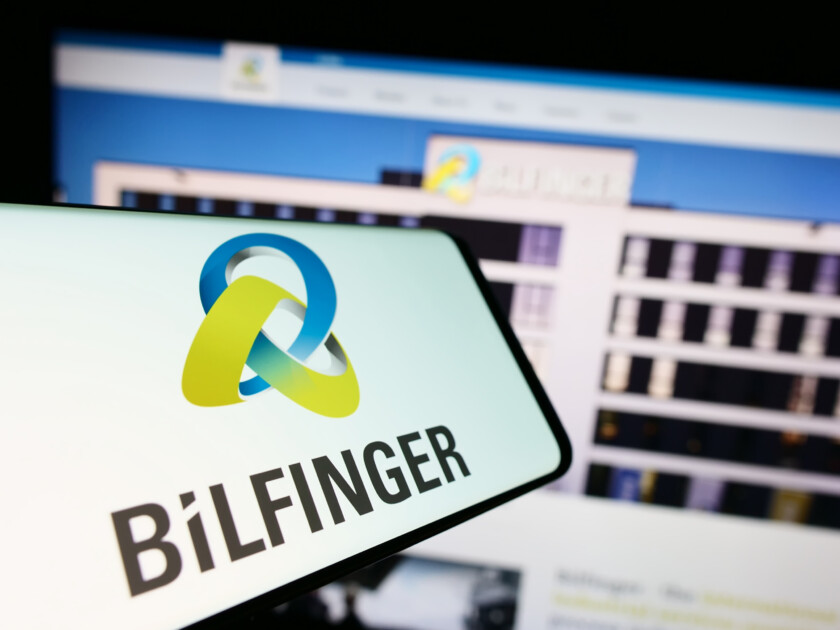 Stuttgart, Germany - 09-14-2023: Mobile phone with logo of German construction company Bilfinger SE on screen in front of website. Focus on center-right of phone display.