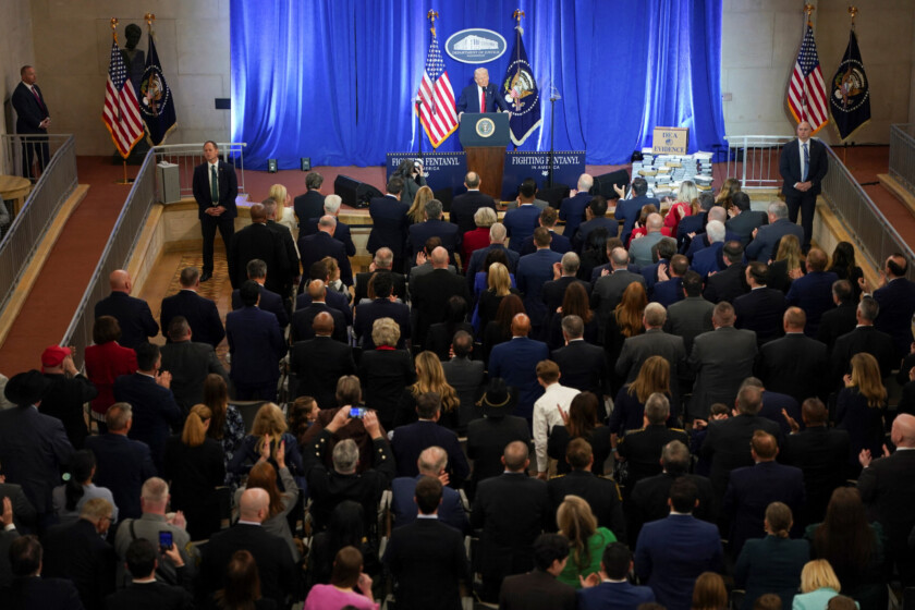 U.S. President Donald Trump speaks during his visit to the Department of Justice to address its workers, in Washington, D.C., U.S., March 14, 2025. REUTERS/Nathan Howard