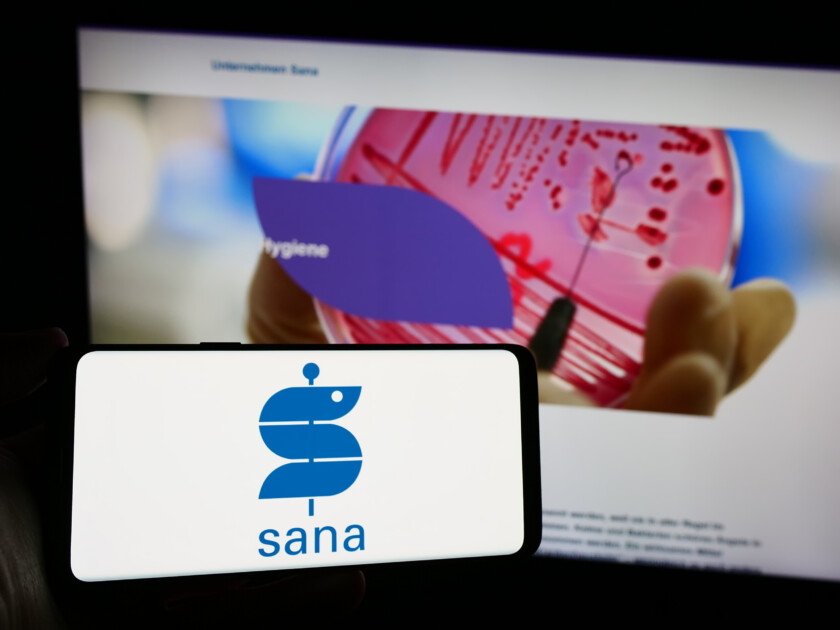 Stuttgart, Germany - 12-31-2023: Person holding smartphone with logo of German healthcare company Sana Kliniken AG in front of website. Focus on phone display.
